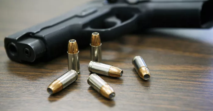 handgun bullets on table 1000x525