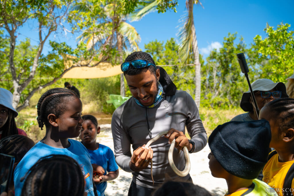 14 eag's wildlife officer teaches students about the antiguan racer's conservation story. credits chaso media